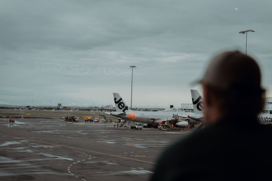 Jetstar aircraft viewed from Sydney Airport terminal